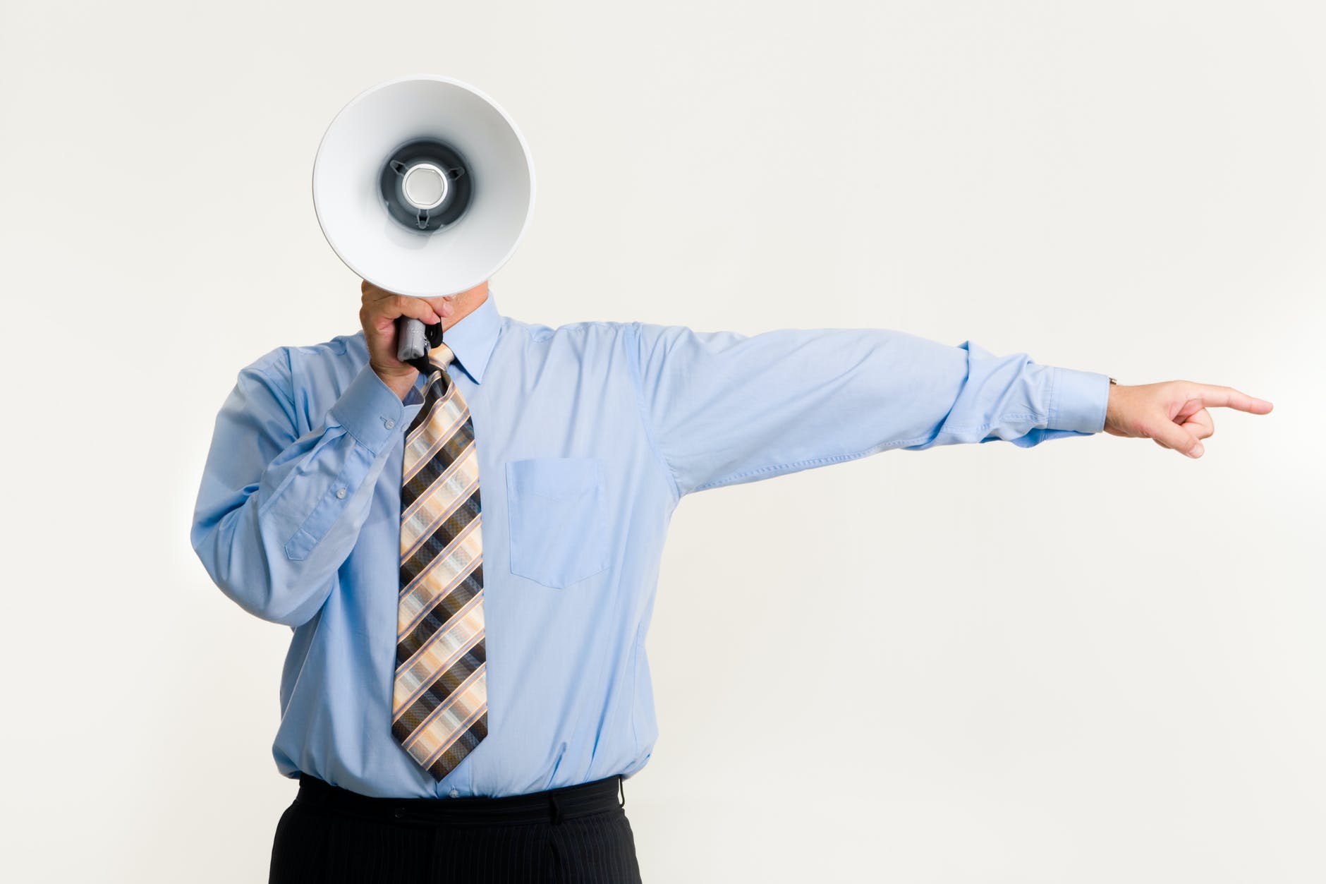 man with megaphone pointing