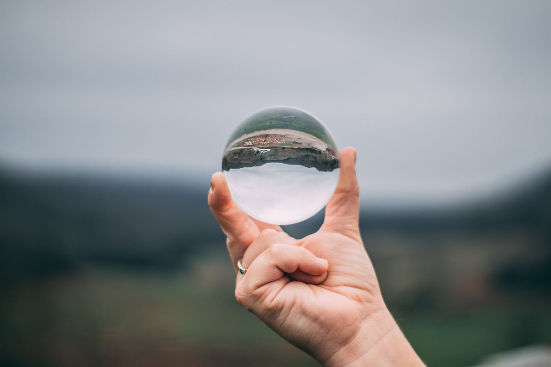 photo of person holding lensball