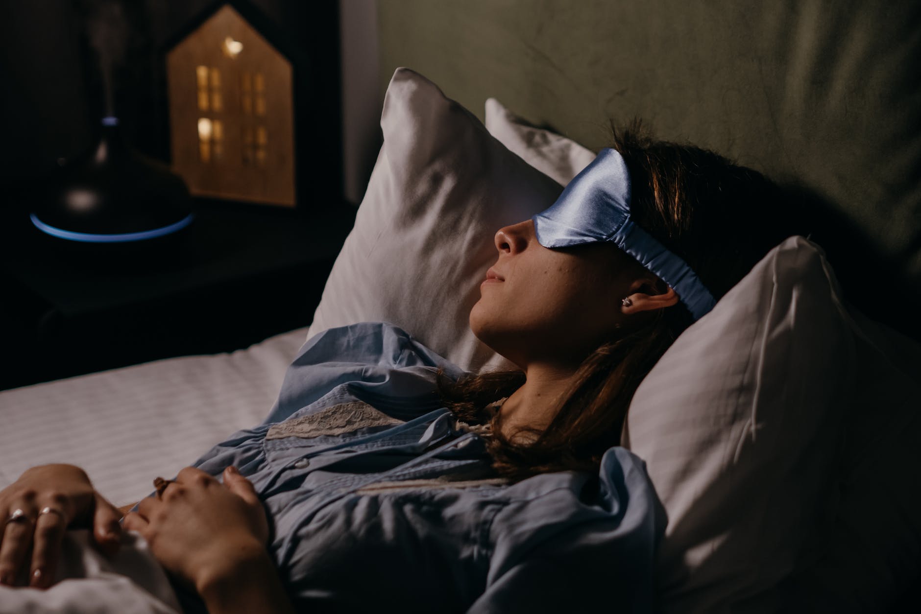 asleep woman wearing eye mask